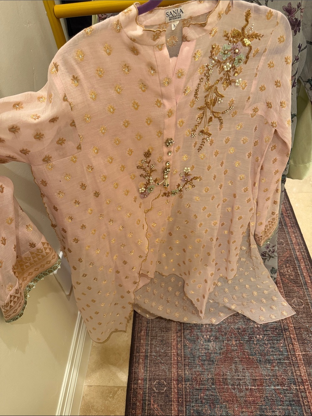 Sania maskatiya Pink Embroidered Kurta with Gold Accents
Pants